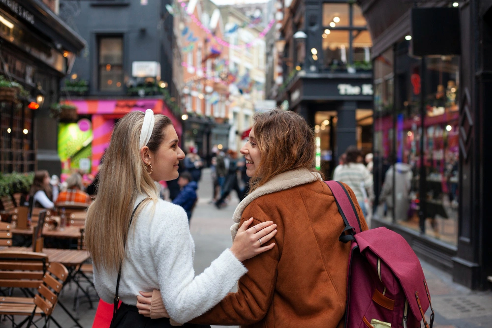 two-women-talking-and-enjoying-their-time-in-covent-garden