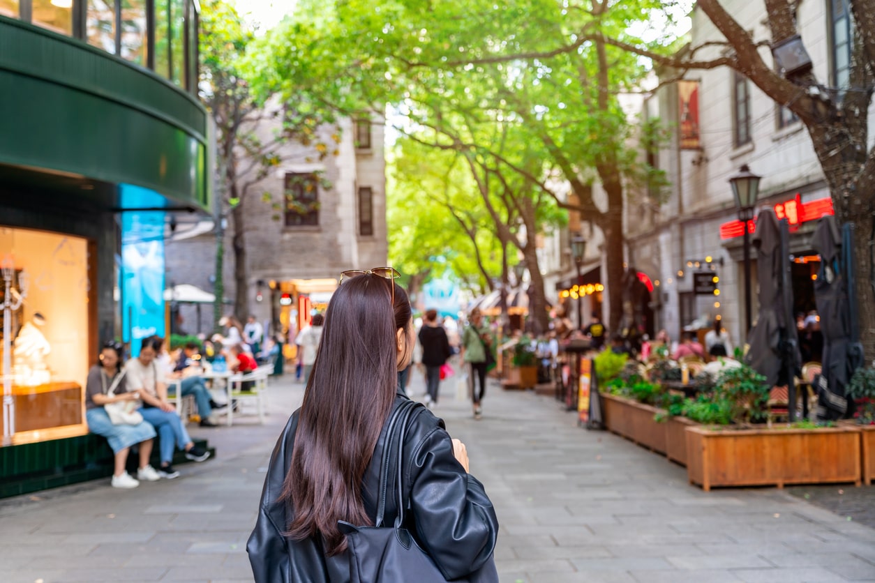 woman-in-black-leather-jacket-walking-in-xintiandi